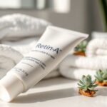 Retin-A cream tube on a bathroom counter with plants.
