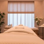 Spa treatment area with skincare products and calming ambiance.